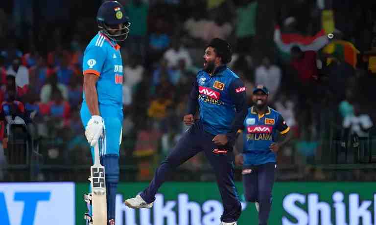 Wanindu Hasaranga celebrates after taking the wicket of India's Axar Patel 