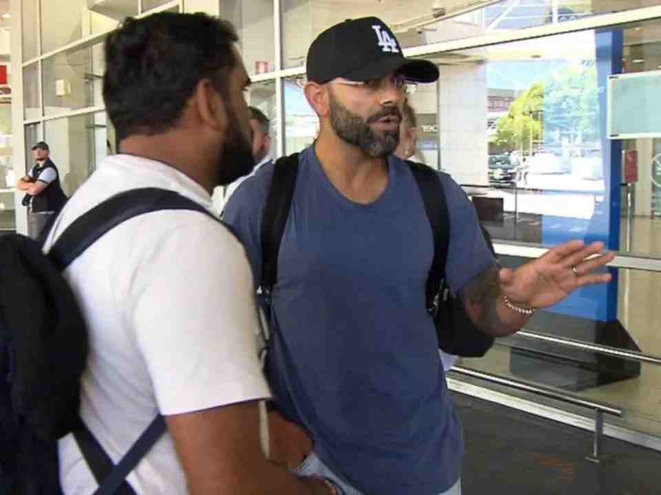 Kohli fumes as reporters surround him at the Melbourne airport