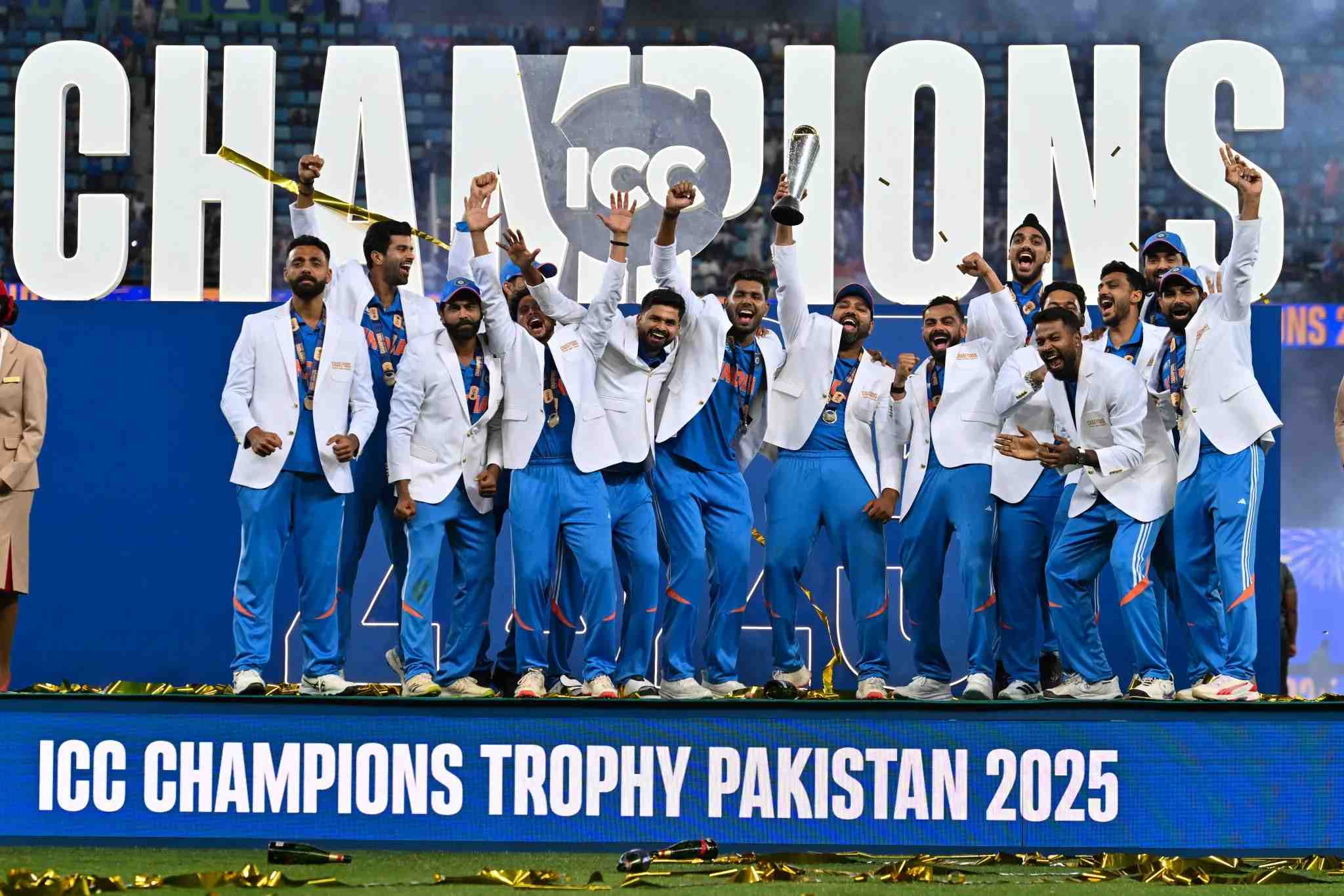 Team India lift the ICC Champions Trophy 2025 in Dubai after their historic victory over New Zealand. 